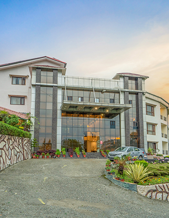 Garden-Facing Sit-outs at Excel Hotels & Resorts Bhimtal