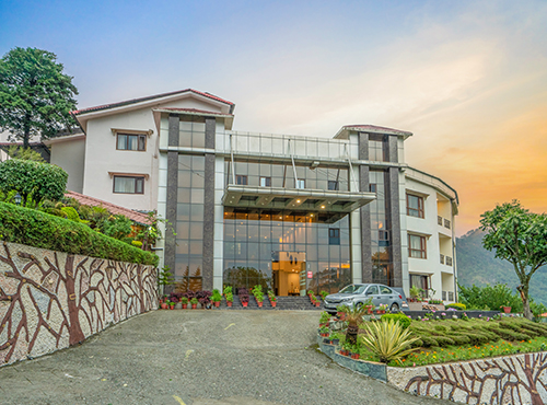 The resort facade lit up at golden hour